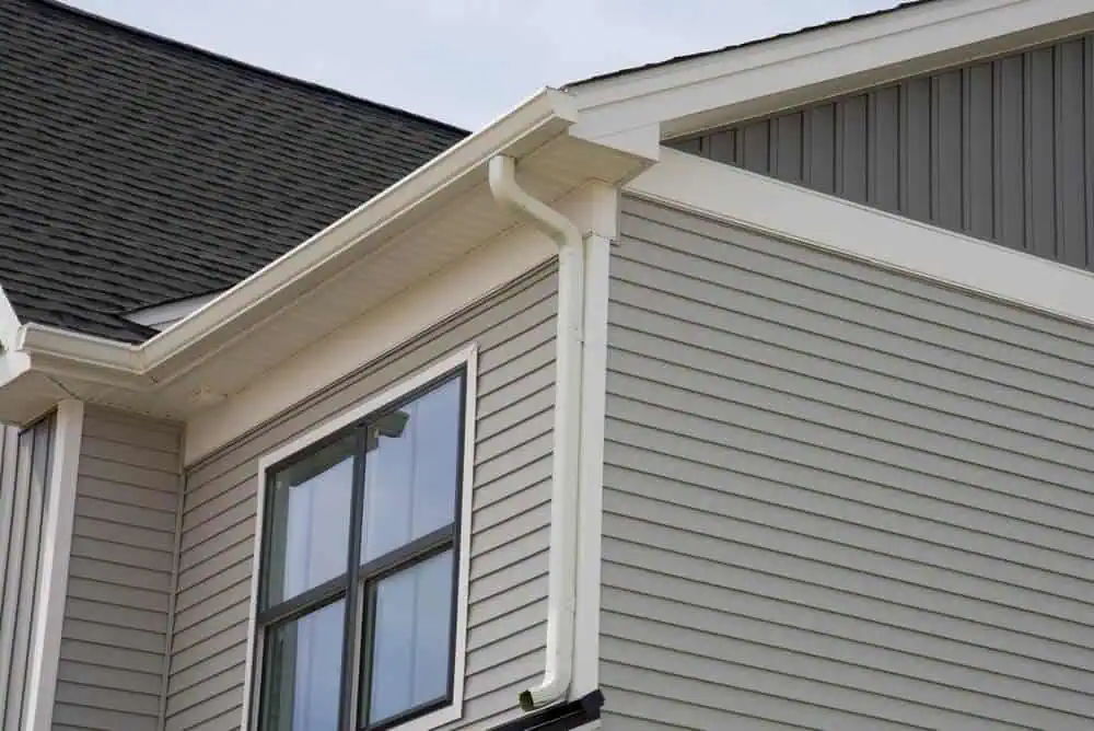 Ferndale House: Gray Siding, Dark Shingles, Quality Gutters.