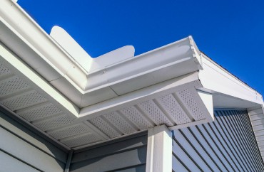 A close up of the gutters on a house, focusing on the exterior.