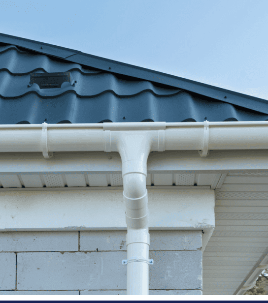 Michigan Gutters and downspouts on an exterior house.