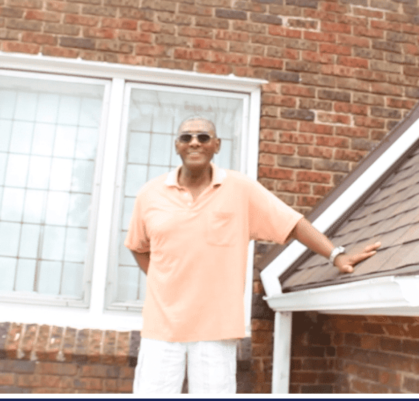 A man standing in front of his home with the text, how to replace a roof.