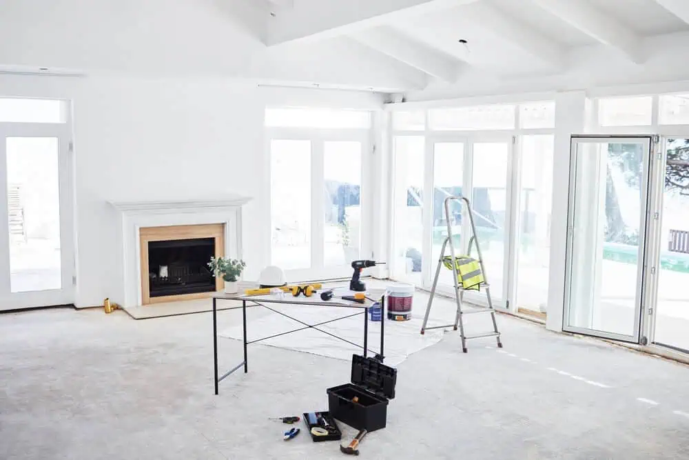 Bright white living room renovation project with natural light.