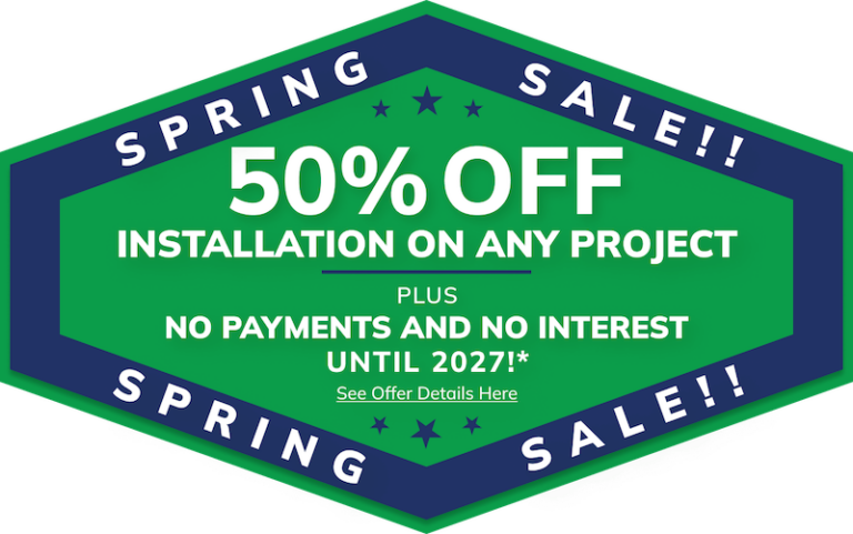 Green and blue hexagonal sign advertises 50% off Michigan home remodeling services.