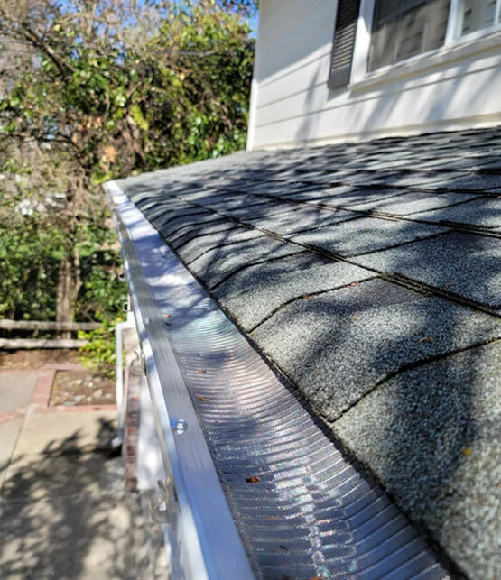 Keep leaves, pine needles, shingle grit, and other debris out of your gutters.