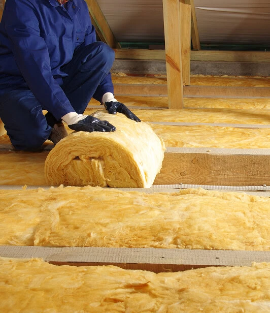 Reduce your energy bills with proper attic insulation.