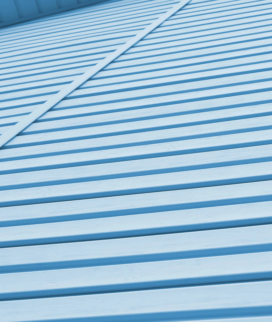 Close-up view of insulated vinyl siding installed on a Michigan home exterior